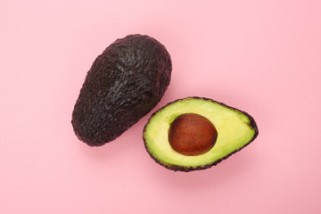 Top view of a ripe sliced avocado isolated © rgvc