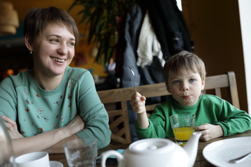 Mother with son in restaurant