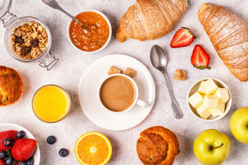 Continental breakfast with fresh croissants, orange juice and coffee.