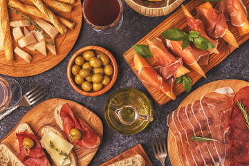 Italian food  background with ham, cheese, olives.