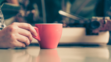 Hand Holding Hot Coffee