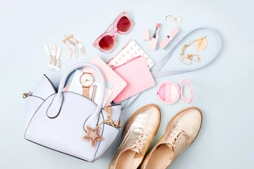 Poster Set of Feminine accessories  with handbag, watch, note, beauty products and shoes. Flat lay, top view. Fashion concept in pastel colored © igishevamaria