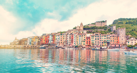 The magical landscape of the harbor with colorful houses in the boats in Porto Venere, Italy, Liguria