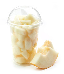 Plastic cup of melone pieces