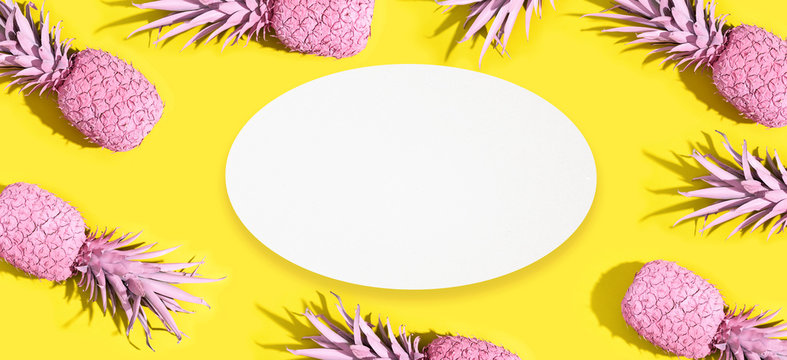 Painted pineapples on a vivid yellow background