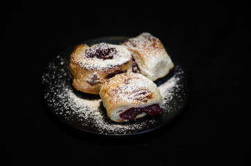 Cherry pie on black background