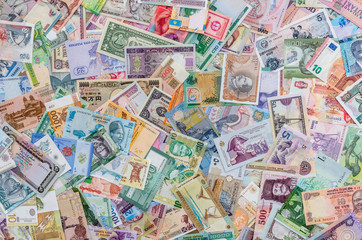 Fototapeta na wymiar Background from collection of all world money banknotes