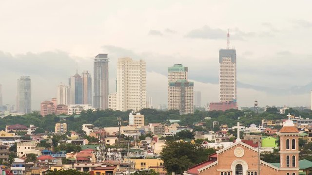 Manila skyscrapers in the cloudy evening. Philippines.