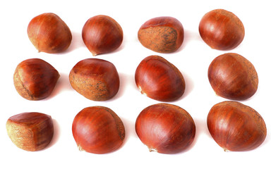 Chestnuts with shell isolated on white background, a pile of fresh chestnuts