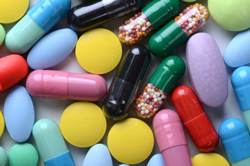 Pharmacy theme. Multicolored Isolated Pills and Capsules.