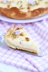 Slice of lemon-pie with nuts