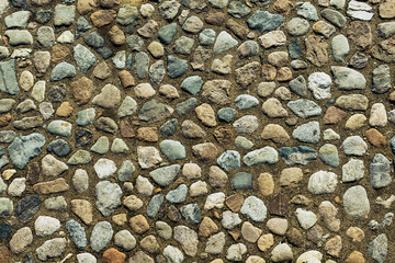 Overhead view of cobblestone street texture.