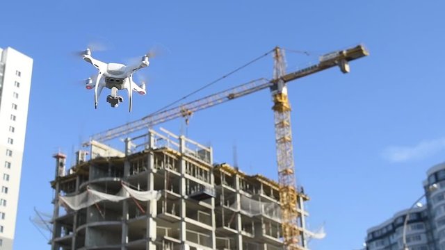 drone survellance over construction area. building site inspection. Slow motion