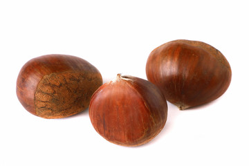 Chestnuts with shell isolated on white background, a pile of fresh chestnuts