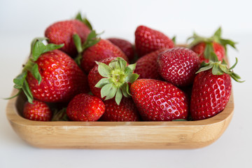 strawberry concept. strawberries isolated. strawberries on the wooden box.