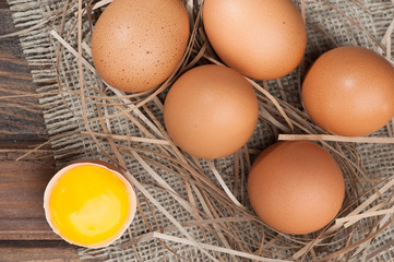chicken eggs on wooden background
