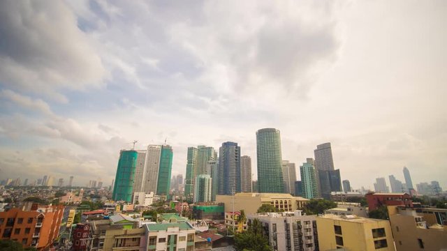Manila skyscrapers in the cloudy evening. Makati District. Filipinos.