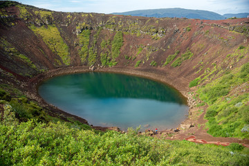 Kerið volcanic crater lake also called Kerid or Kerith in southern Iceland is part of the Golden...