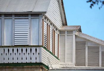 old house with louvered shutters and decoative wooden balcaony, St. Croix, U.S. Virgin Islands,Lesser Antilles, Caribbean