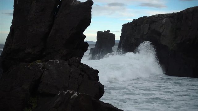 dramatic rocky coastline at dusk