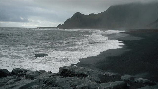 dramatic rocky coastline at dusk