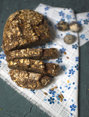 dark background with bread on the napkin and eggs