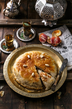 Middle eastern pie with tea, traditional style