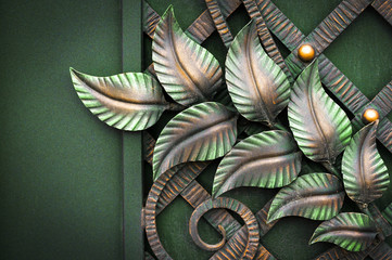 forged leaves on the gate