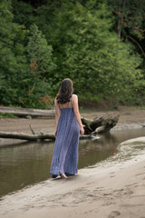 girl walking by creek