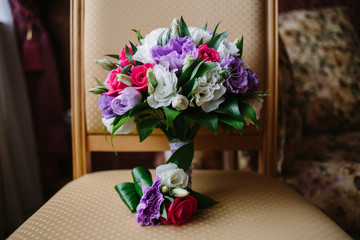 a wedding bouquet and a boutonniere