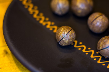 macadamia, Australian nut in a ceramic plate