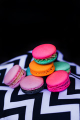 bright colors of a delicate round cookie with a sweet cream