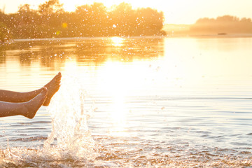 A pair of lovers sits on the bridge