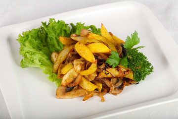 Fried potato with mushrooms