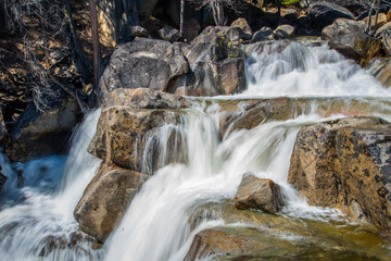 Fototapeta premium Long exposure of Rushing Waterfall at Yosemite National Park 