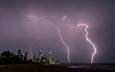 Lightning bolts against the Gold Coast skyline