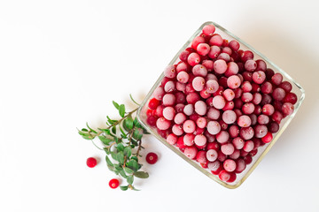 fresh-frozen cranberries on white background for your logo