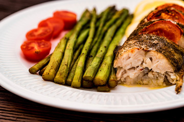 Roasted zander fillet with asparagus and lemon