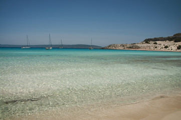 Fototapeta premium Crystal clear waters of exotic Simos beach at Elafonisos island in Greece