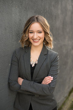 Buisness Woman Grey Suit Arms Crossed