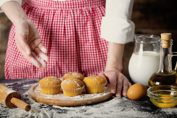 Making dough by female hands at bakery