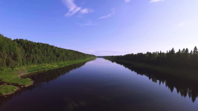 Aerial cinematic view beautiful wide rive in dense forest