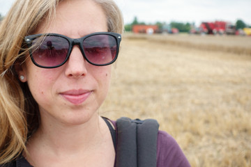 Portrait of woman with rural background