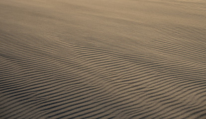Wellenmuster im Sand