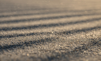 Fototapeta na wymiar Wellenmuster im Sand im Wind
