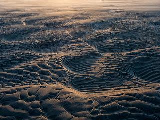 Wellenmuster im Sand