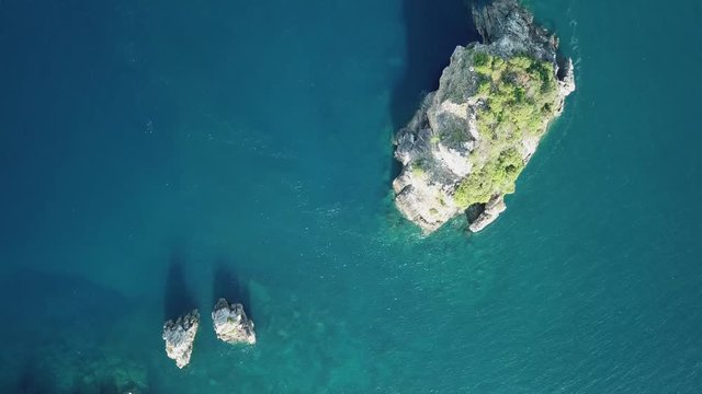 Aerial view from a drone of beautiful Nyaung Oo Phee island on sunny day in Myanmar
