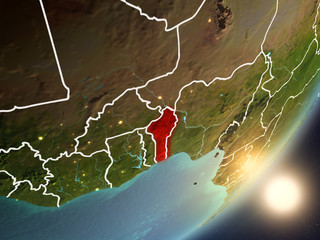 Sun rising above Benin from space