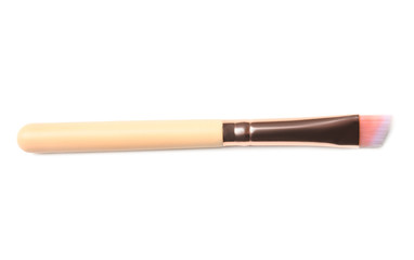 Makeup brush of professional artist on white background