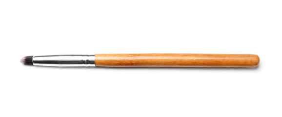 Makeup brush of professional artist on white background